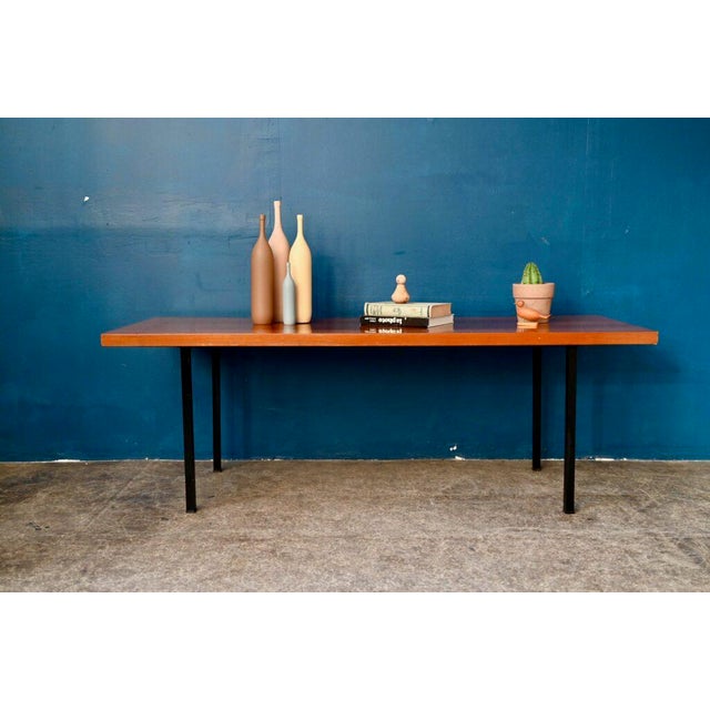 with its minimalist lines, this coffee table boasts a modernist design typical of the 1950s. The understated and airy...