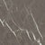 Sculptural table in Pietra Grey marble (100x100x30 cm). The glossy surface enhances the depth of the pure black, traversed...