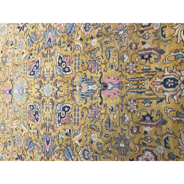 Beautiful mid-20th century large rug with a nice decorative design and a part yellow field and a little second part with a...