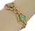 This is an estate bracelet, crafted from 18 yellow gold featuring 5 fancy open floral shape link with a textured finish,...