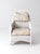 This early 20th-century wicker lounge chair combines the airy ease of painted porch furniture with the tailored lines of...