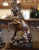 This charming antique fox terrier sculpture captures the alert expression and spirited personality of the beloved hunting...