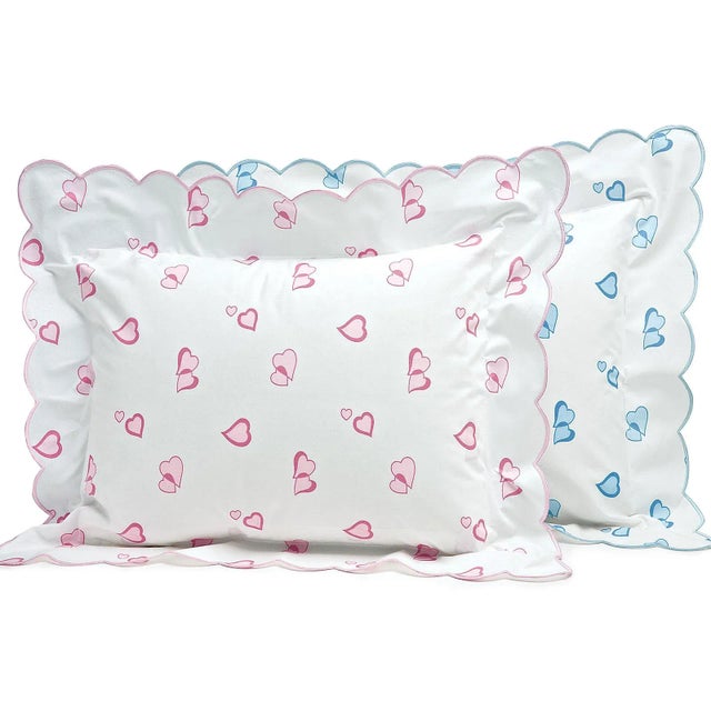 This new design is based on our idea that "2 hearts beat as 1" and feature a multitude of entwined hearts printed in Pink...