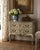 There is something particularly charming about mid-century American interpretations of French furniture, and this Bodart...