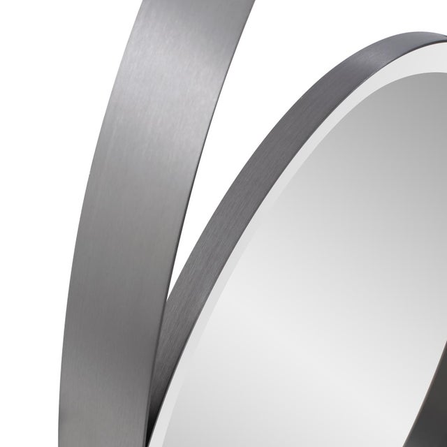 The Kenworth Modern Mirror is an optical illusion encased in a sleek steel gray frame. This mirror creates a dimensional...