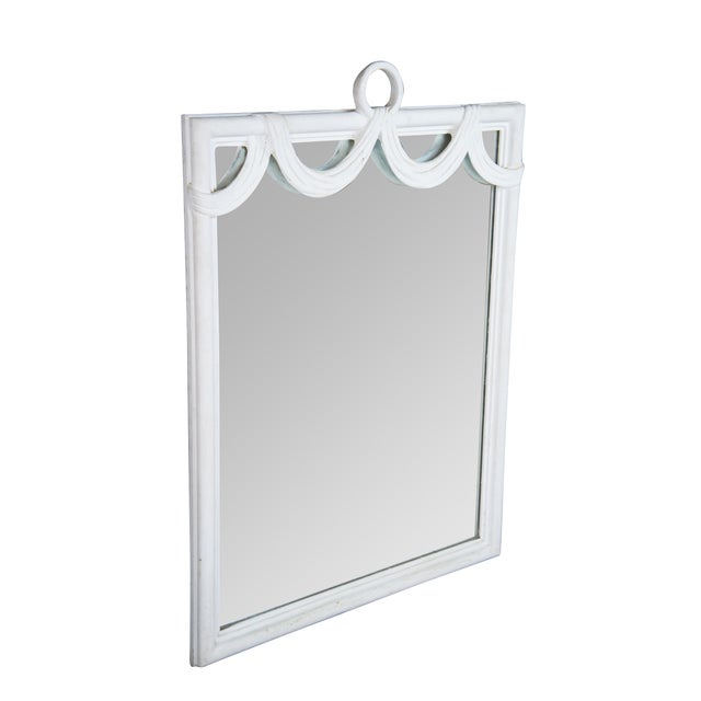 A very large and impressive vintage Neoclassical / Hollywood Regency style vanity mirror featuring a white painted finish...