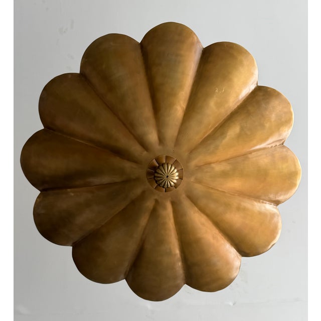 Elevate your home with this handcrafted pure brass pendant light, featuring an elegant scalloped floral design inspired by...
