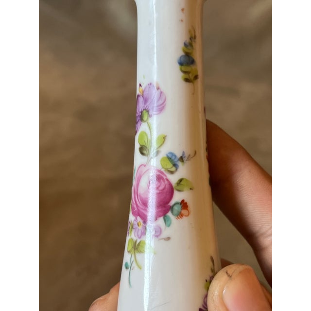 antique German porcelain column candlestick, beautifully handcrafted by the renowned Sächsische Porzellanmanufaktur Carl...