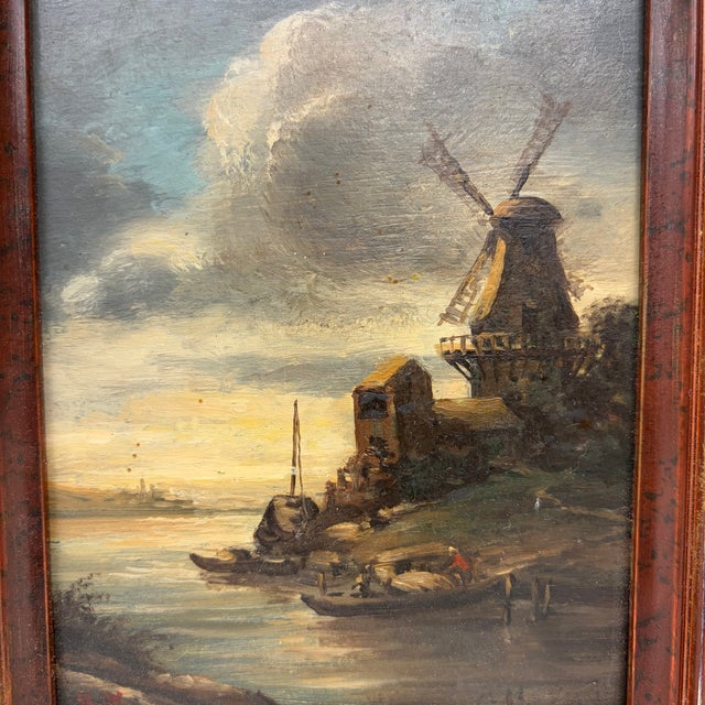 Antique oil painting: Dutch School landscape painting from the 19th century with a later faux burl painted wood frame,...