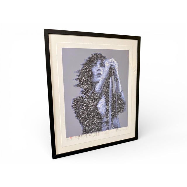 A contemporary typographic portrait of American musician and poet Patti Smith, created by British artist Mike Edwards as...