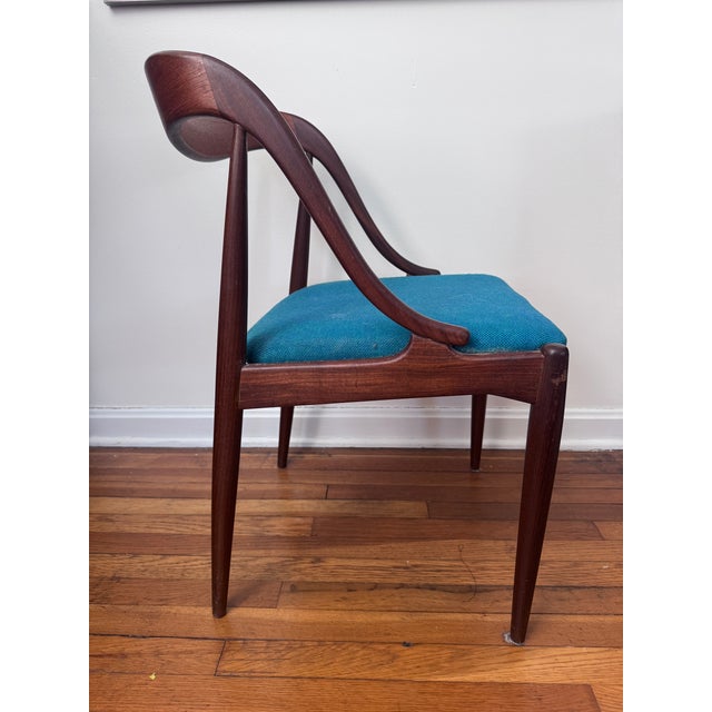 A sculptural Model 16 armchair designed by Johannes Andersen and produced by Uldum Møbelfabrik in Denmark circa 1965. This...