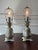 A symbol of hospitality, pineapples are frequently included in homes. This silver plated brass pair of petite footed...