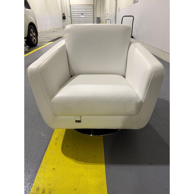 Offered is a matching pair of authentic ZURI designer swivel lounge chairs, combining modern sculptural design with...