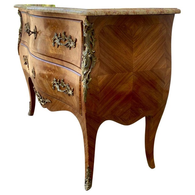 Magnificent Louis XV style marquetry piece with a beautiful veined marble top. Excellent overall condition. Dimensions:...