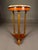 An elegant Italian neoclassical marble-top lamp table showcasing classical architectural influences and exceptional...