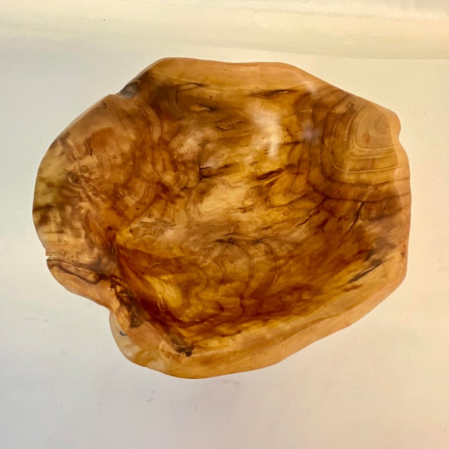 This is a gorgeous Rustic European Style Live Edge Teak Root Decorative Bowl. It features an intricate wood grain and...