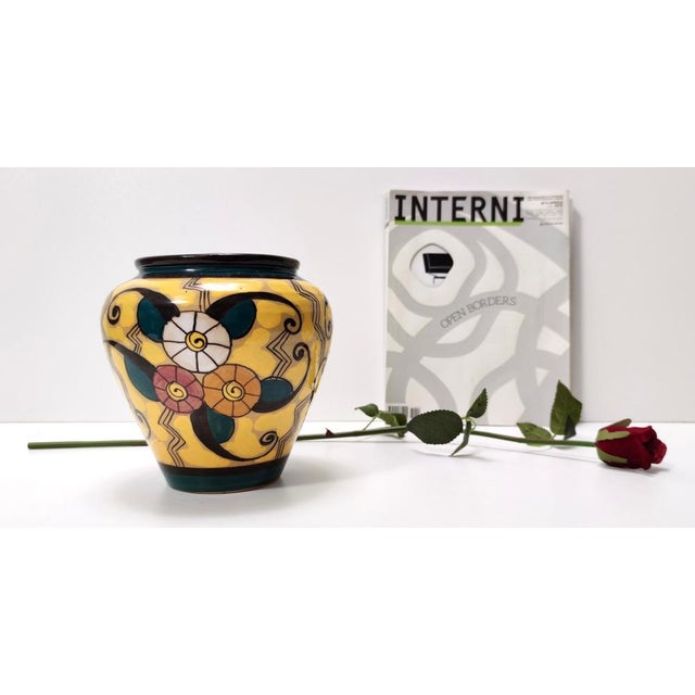 Made in Italy, 1920s. This vintage vase is made in glazed earthenware. It is a vintage piece, therefore it might show...