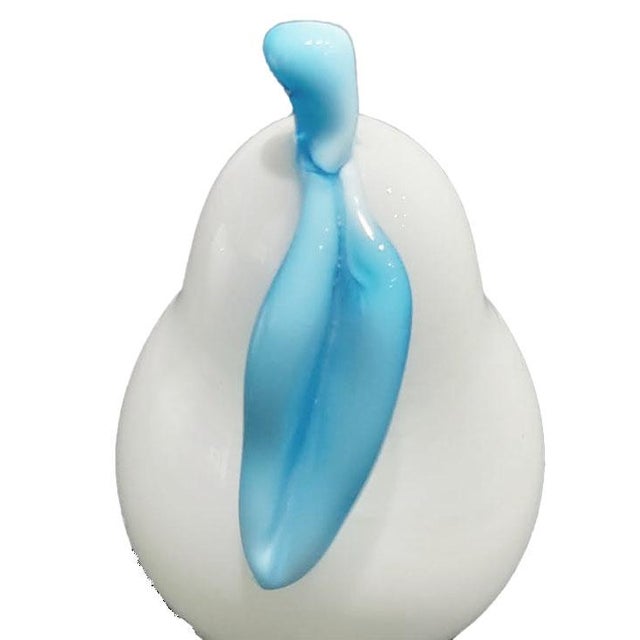 AI Overview This is a set of Murano white and sky blue Italian art glass pear and apple fruit sculptures. These are...