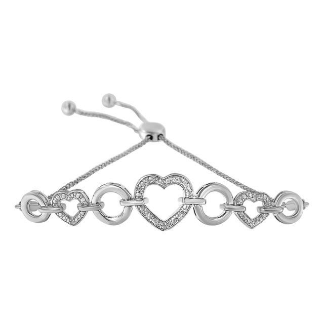 .925 Sterling Silver Diamond Accent Interlinking Triple Heart 4���-10��� Adjustable Bolo Tennis Bracelet (H-I Color, I2-I3 Clarity) For Sale