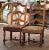 Decorate a study, bedroom, or sitting area with this elegant pair of antique walnut chairs. Crafted in southern France...