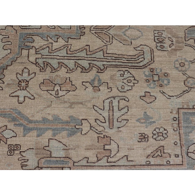 Measures: 9'10 x 13'6 Heriz-Serapi Design Rug with Ivory Field and Soft Blue Medallion. Keivan Woven Arts / Rug/AWR-12000,...