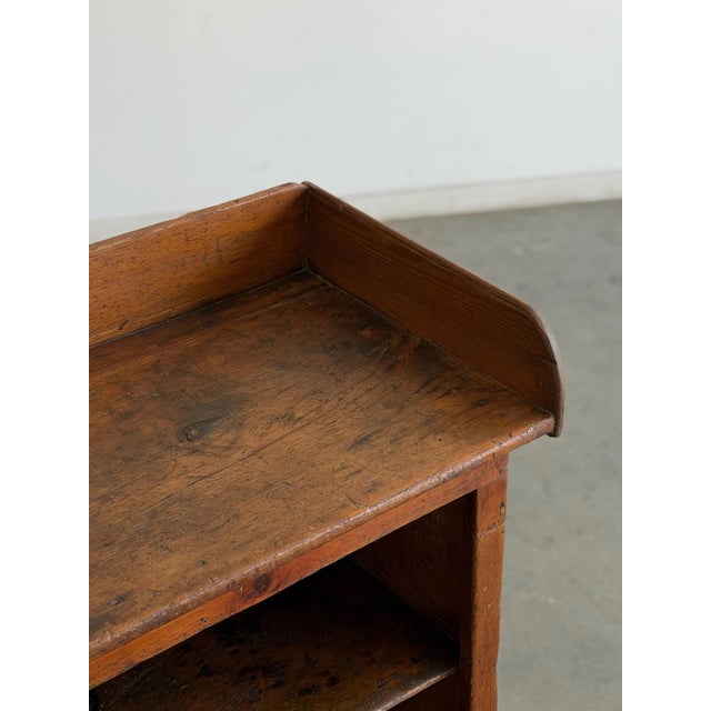W35 D18 H34.5 SHELF H12 H10 Charming antique rustic bucket bench cabinet with a warm wood finish and raised back and side...