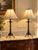 This vintage pair of French Empire Revival table lamps showcases the stately proportions and classical detailing...
