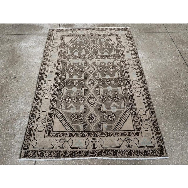 This Mid-20th century Persian Malayer rug, measuring 3' 6" x 5' 4", showcases the refined artistry and timeless aesthetic...