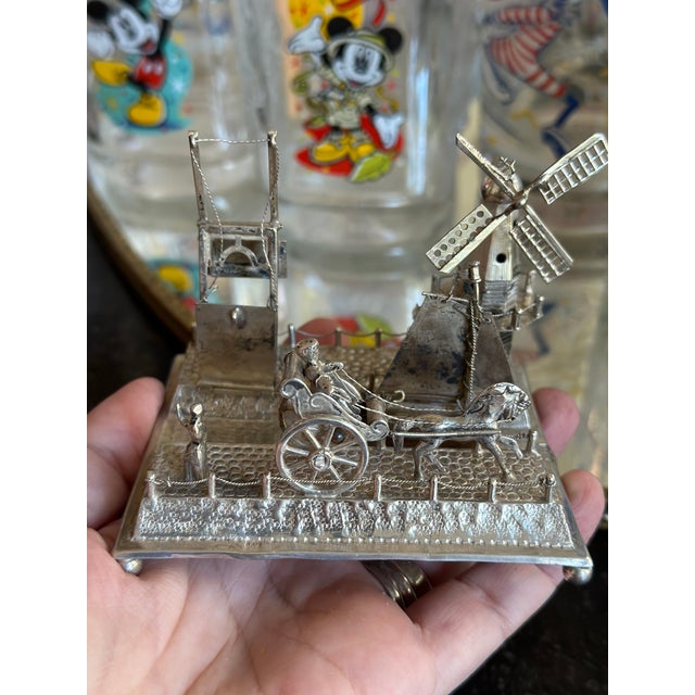 .883 Dutch Silver quay scene with kinetic bridge and windmill. It has incredible detailing, from the cobble stones to...