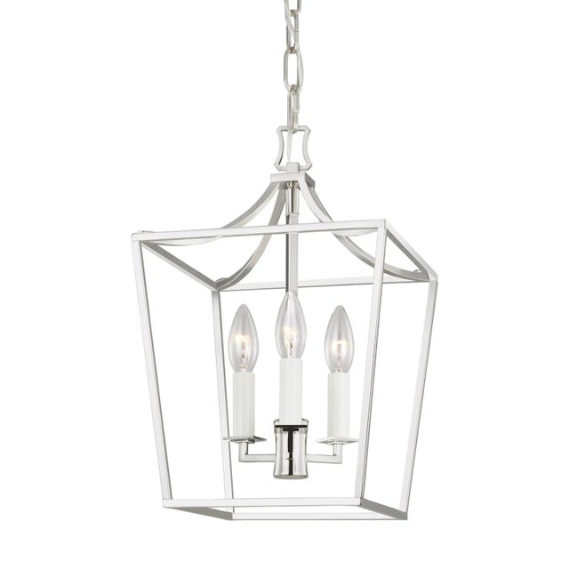 Southold by Chapman & Myers pairs curves and lines to form a classic geometric silhouette. This new, contemporary lantern...