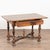 19th century Danish side table with single drawer, crafted in oak and other woods combined. The base has a striking...