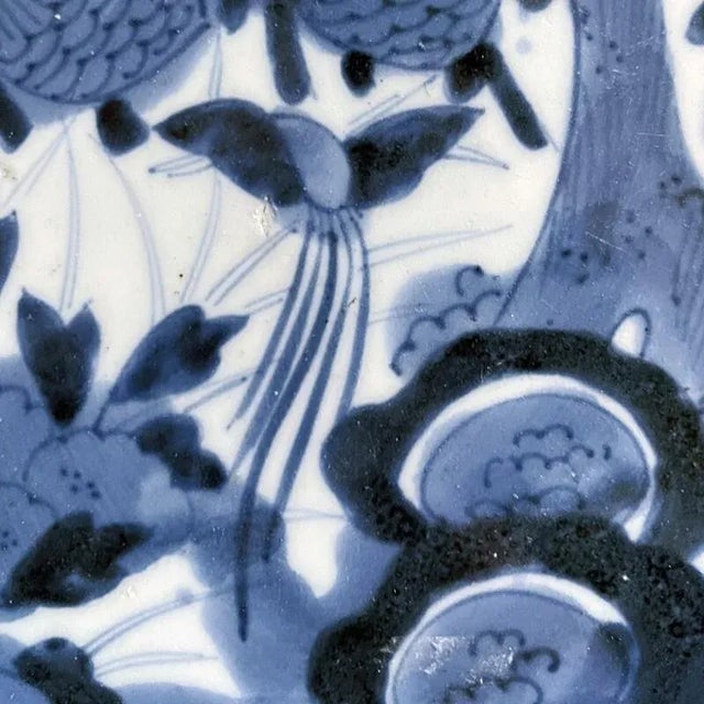 A beautiful pair of Arita plates from the Edo period. Sold as a set of 2. Painted in underglaze cobalt depicting...