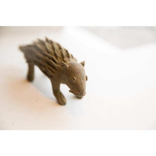 :: Vintage handmade African porcupine sculpture. Circa late mid 20th century, though possibly older, this piece has such...