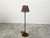 An English vintage woven basket adjustable floor lamp from the mid 20th century with single light, wired for the US....
