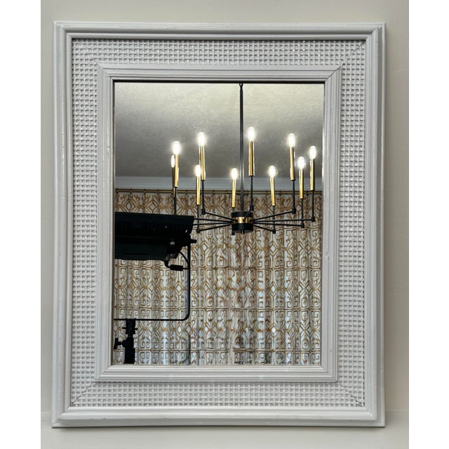 The combination of the painted white wood and the natural woven cane adds a bit of texture and a casual yet elegant look...