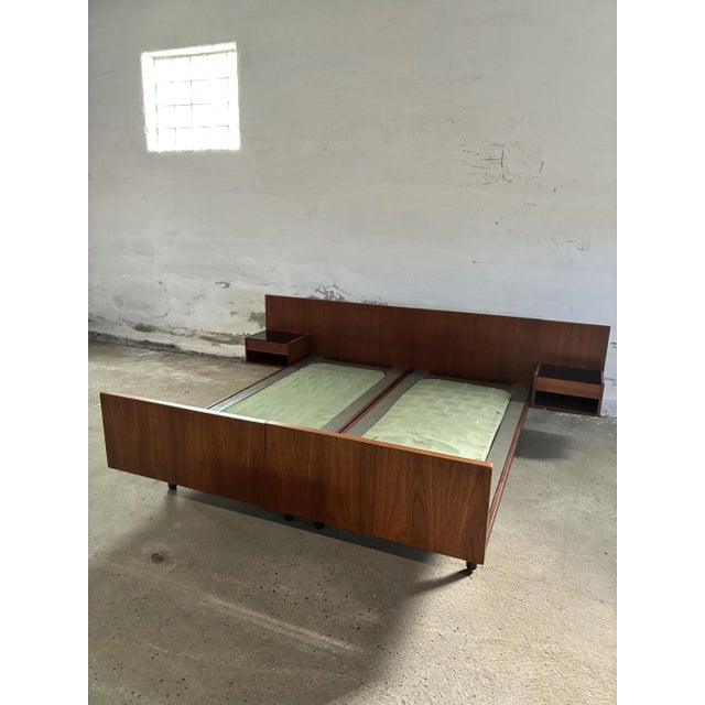 This Hans J Wegner queensize bed is sold without madresse This piece has an attribution mark, I am sure that it is...