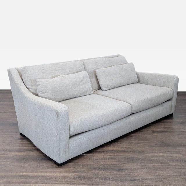 This Crate and Barrel 3-seat sofa features a modern, clean design in a soft light herringbone fabric. Comfortable cushions...