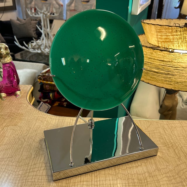 Very attractive Italian hand blown green disk lamp on chrome standing base. Found on the Island of Murano in Venice,...