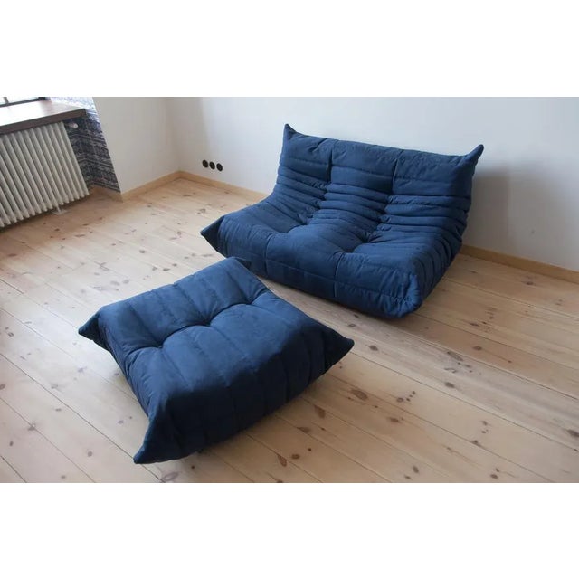 This Togo has been reupholstered with new foam and high-quality new fabric, keeping its inner structure giving the item...