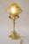 Floral Jugendstil table lamp with loetz glass shade around 1908 Brass polished and stove enameled Original loetz glass...