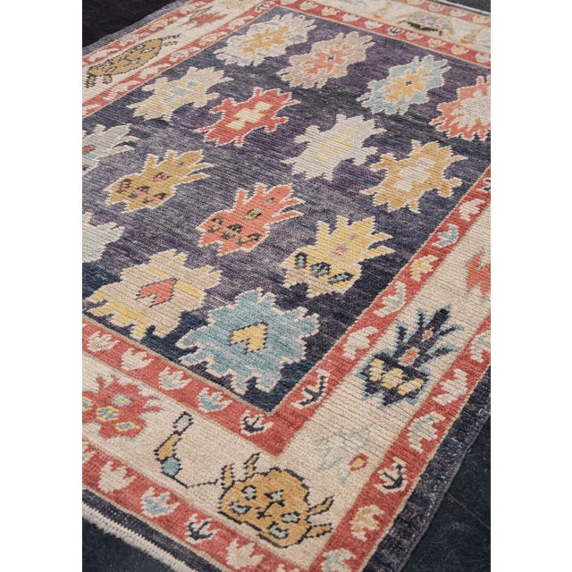 Turkish Oushak Rug Multicolor Handwoven Tribal Design Rug 5'7" x 7'10" This vibrant, handwoven Turkish Oushak rug features...