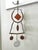 The image shows a pair of mid-century modern hanging metal and glass sculptures, which appear to be attributed to the...