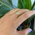 A classic plain band in solid 14K yellow gold, smooth and substantial at over four grams. Timeless and versatile, it wears...