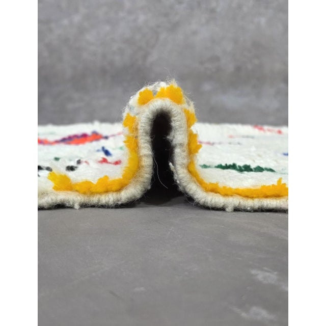 Atlas Rug – Handmade Moroccan Berber Wool Rug This handmade Atlas rug is a colorful expression of Moroccan Berber...