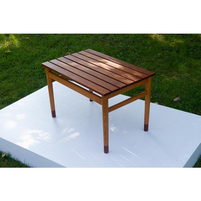 Vintage Danish teak and beech side table 1950s. Beautiful table with top in solid teak and frame in solid beech with teak...