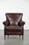 Offered for sale: this luxurious sheepskin armchair with a timeless look and a beautiful dark color. This luxurious...