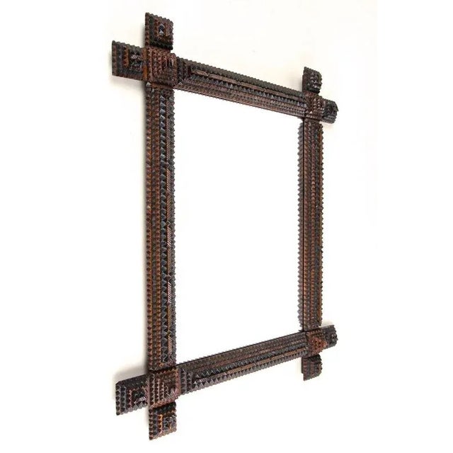 Absolutely outstanding, rustic Tramp Art wall mirror from the late 19th century around 1880 in Austria. This very special...