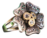 Gold and Silver Ring with Flower-Shaped Zirconias