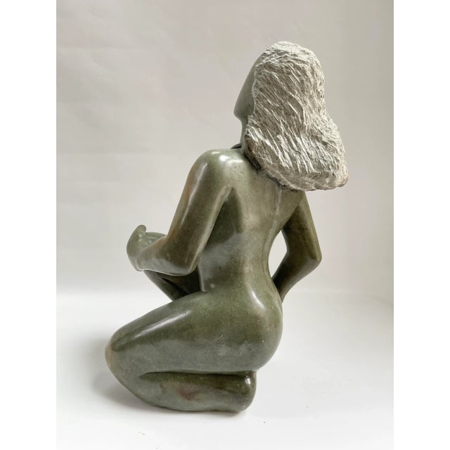 Large Mid-Century Modern very heavy green marble female nude sculpture. Circa, 1970s. The piece is unsigned. Originally...