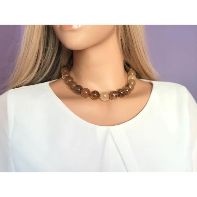 We are excited to present our newest addition to the collection - a stunning Rutilated Quartz necklace. Measuring 17.5...